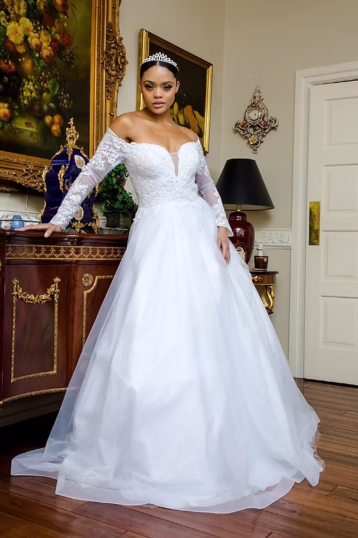 Off-the-shoulder long-sleeve lace wedding dress Phoenix AZ - Strictly Weddings